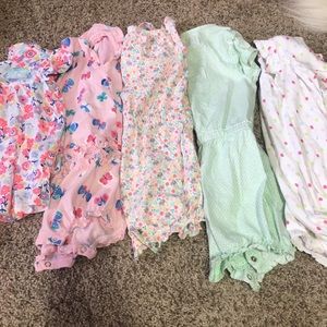 4 rompers and 1 shirt
